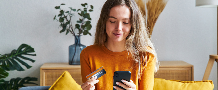 Girl utilizing digital banking with her mobile device