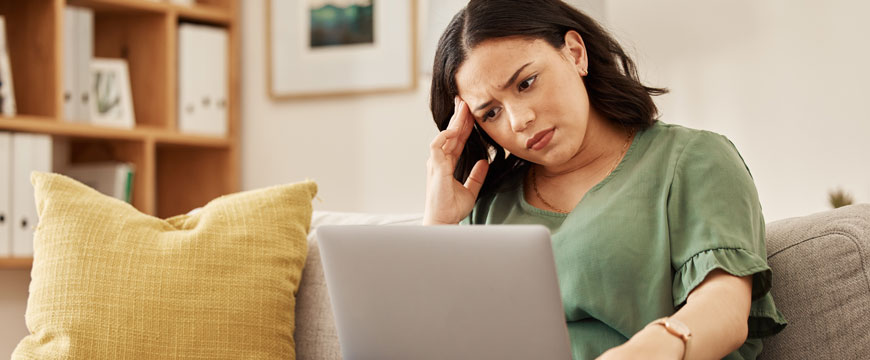 Girl Looking at a Computer Screen Confused