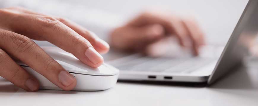 Hand on Computer Mouse