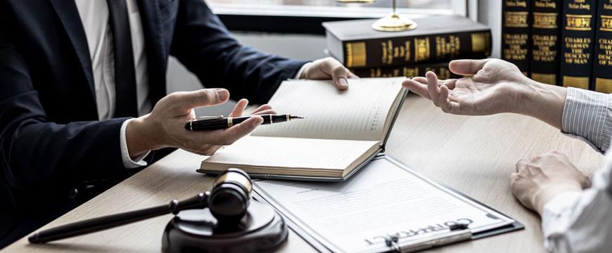 Two Individual's Hands at a Law Firm