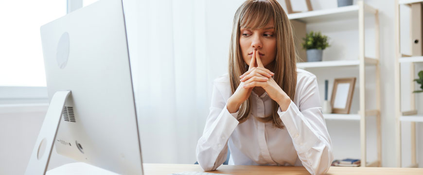 Girl Looking at a Computer