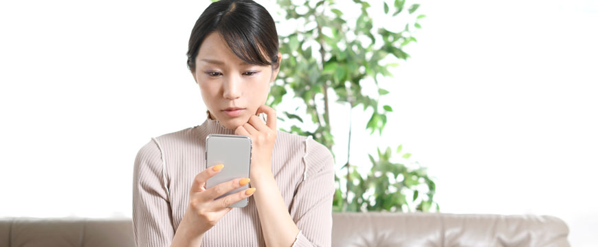 Girl Looking at a Phone