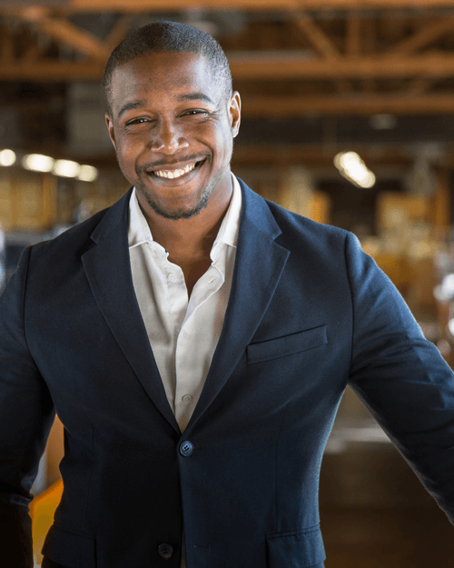 Businessman in industrial building