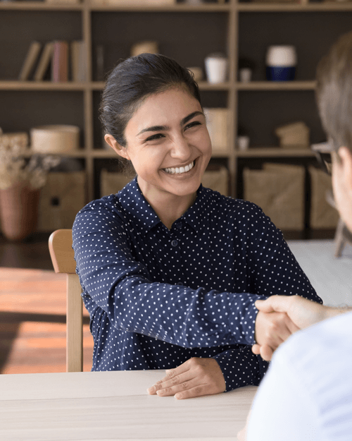 Business woman shaking hands