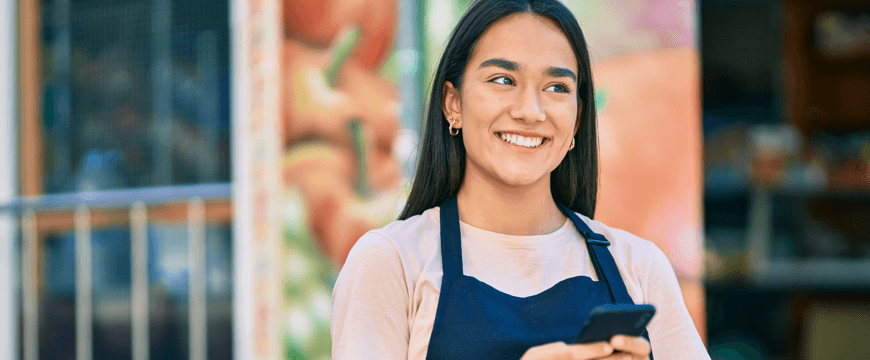 Business owner using mobile phone