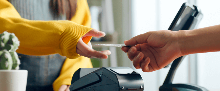 Man using card to make a purchase