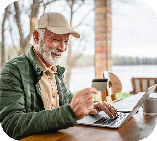 Man using credit card to pay online