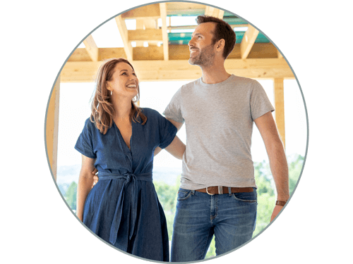 Couple touring home under construction