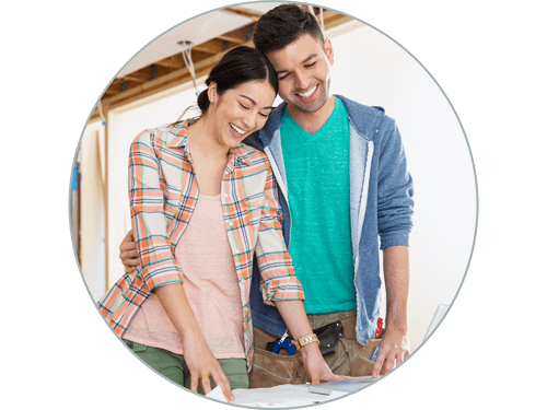 Couple looking at remodel plans