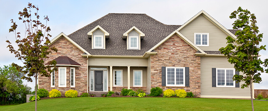Home Equity Loan and Lines - image of beautiful house with landscaped yard